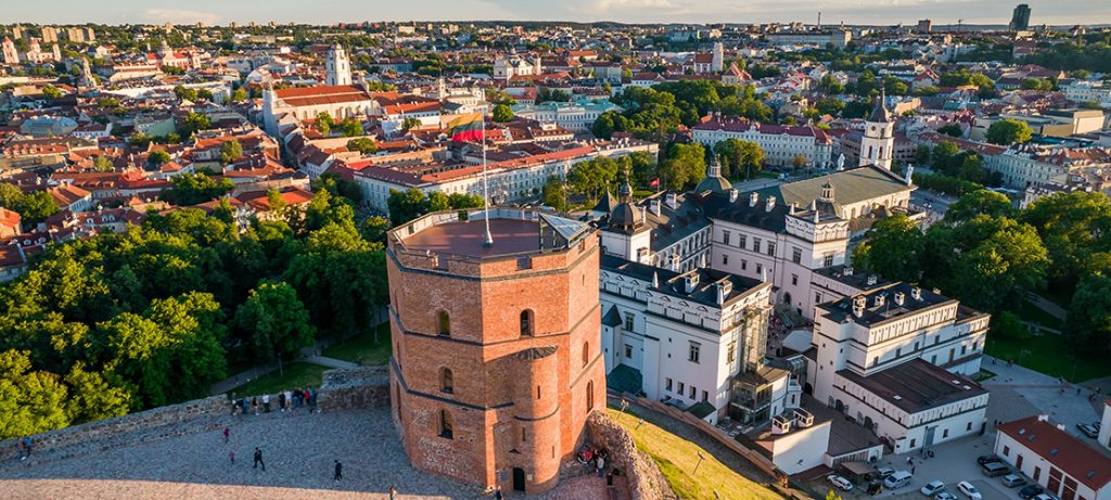 Aerial view of Gediminas castle and it's old town during sunny summer day.