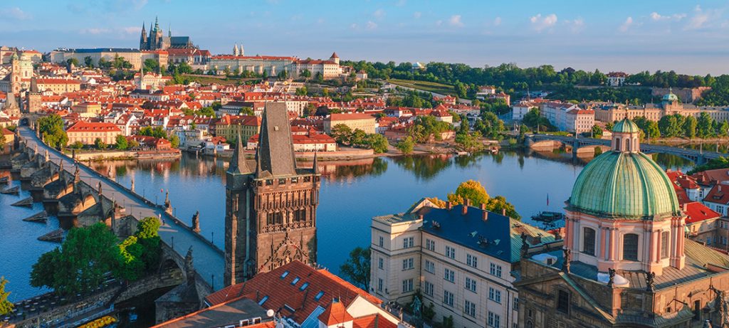 Aerial view of Charles bridge during sunrise in Prague Czech Republic