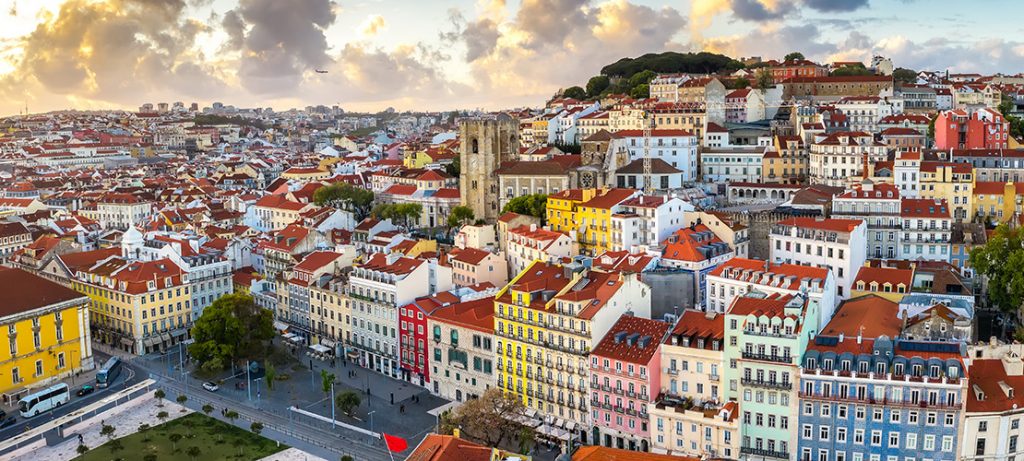 Lisbon cityscape panorama Alfama Portugal, beautiful European city summer, colored houses roofs